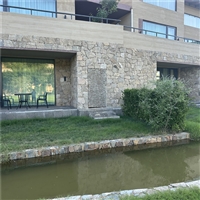 玄关屏风 黄色碎拼石 虎皮黄不规则大理石 黄河砂岩文化石外墙