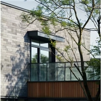 花园铺设 灰色火山岩颗粒 黑色洞石文化石 红褐色火山石碎拼石