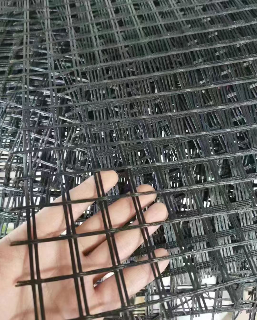 黑龙江沥青路面防裂玻纤网生产厂家