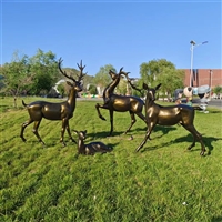 Fiberglass deer sculpture imitating copper deer sculpture