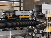 Conical twin-screw extrusion double wall corrugated pipe production line
