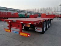Short flatbed semi-trailer