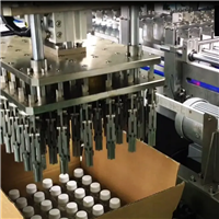 PLC controlled drop type packing machine plastic bottle side push type packing equipment 20 boxes/minute